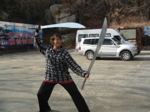 Sensei Bryce in China with a pair of Dragon Swords*